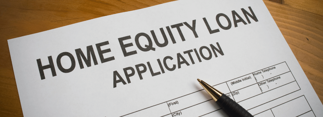 A picture of a Home Equity Loan Application with a pen on top